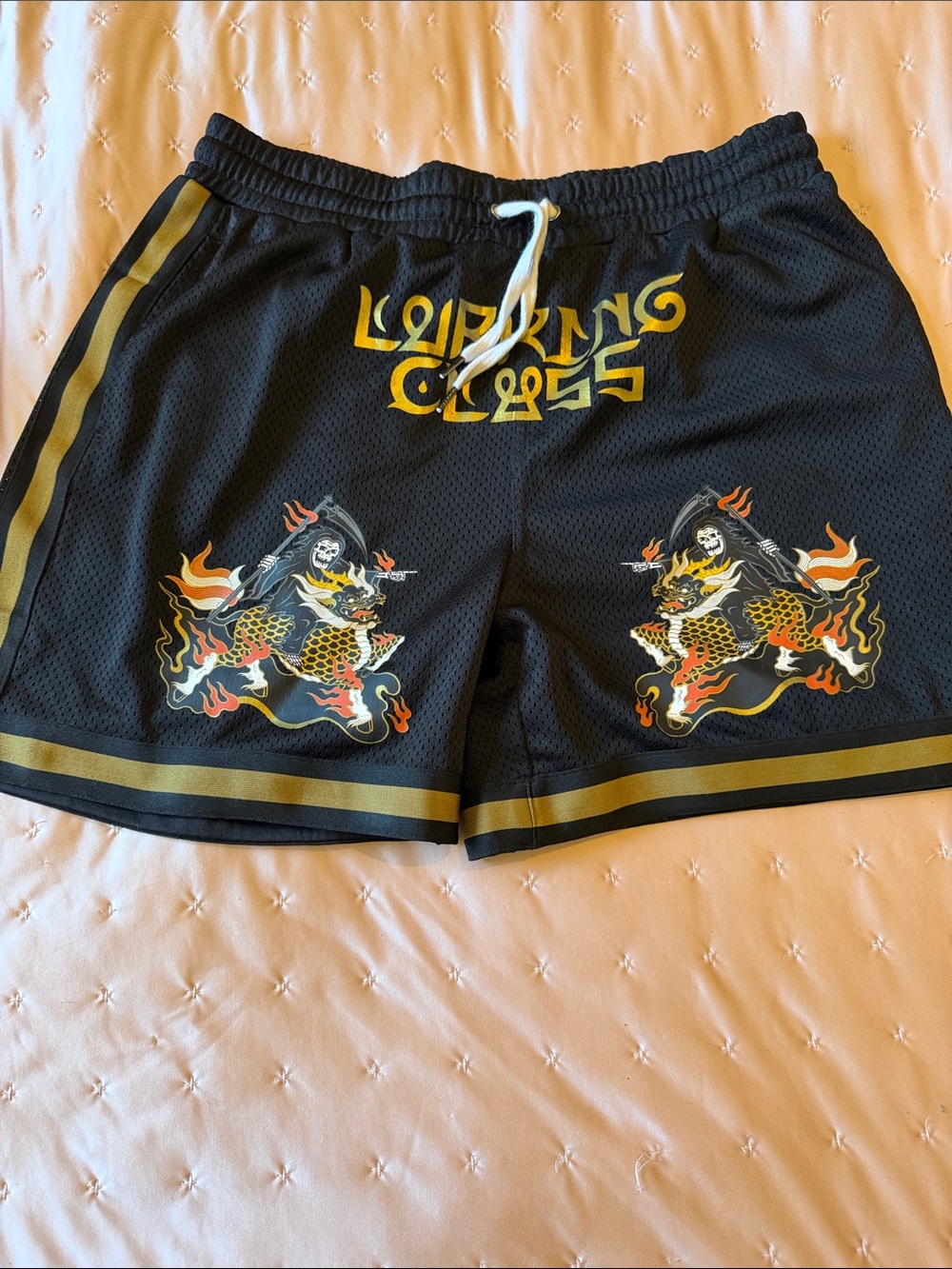 Men's Black Athletic Mesh Shorts with Gold Trim and Graphic